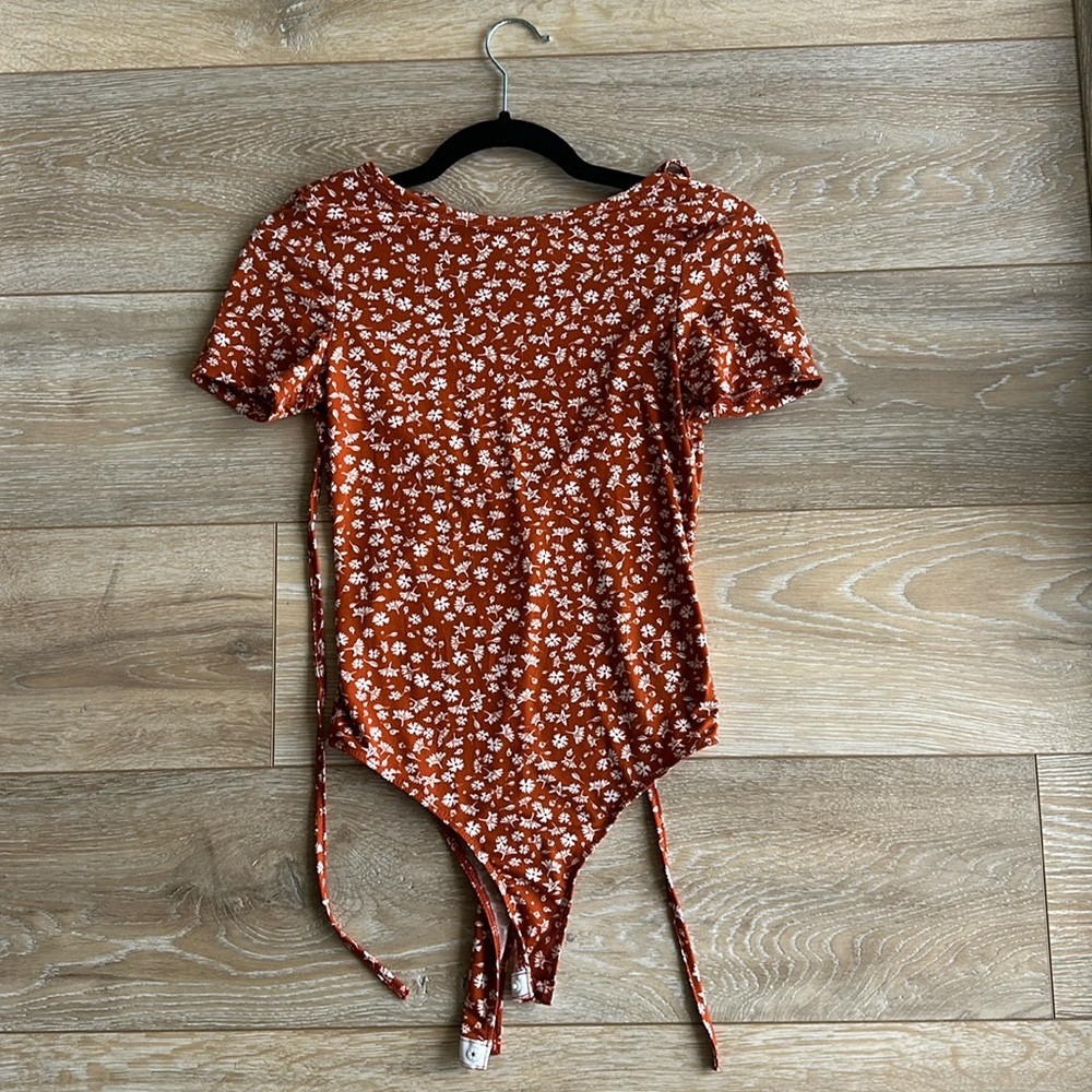 Rusy colored floral short sleeve bodysuit